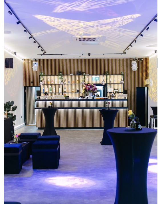No15 venue prepared for an event with the bar illuminated